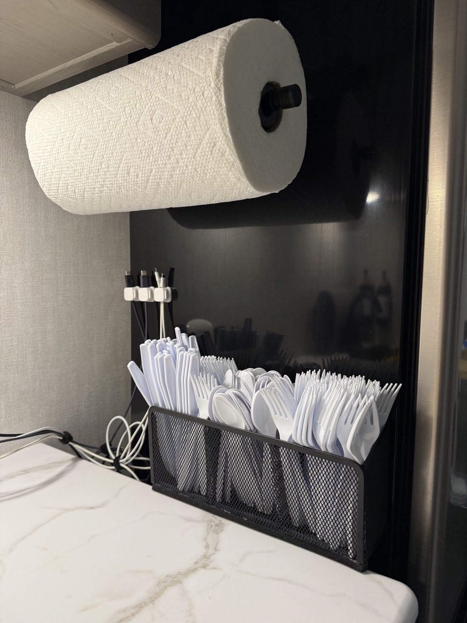 Magnetic paper towel holder on refrigerator